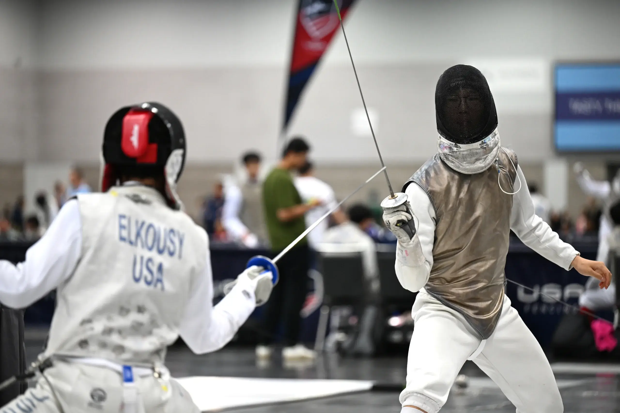 A new fencer taking a first lesson at Metro Tacoma Fencing Club